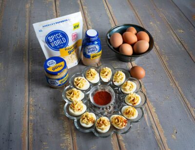 Ingredients and prepared deviled eggs displayed for a delicious cooking recipe featuring garlic and eggs
