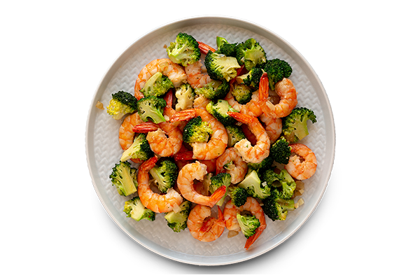 Healthy dish of shrimp and broccoli served on a white plate
