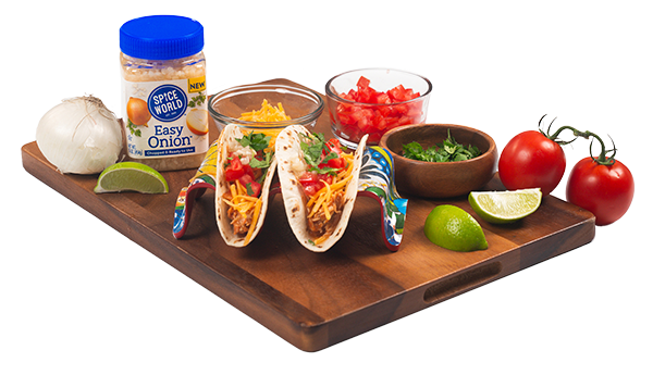 Delicious taco meal setup with fresh ingredients and condiments on a wooden board