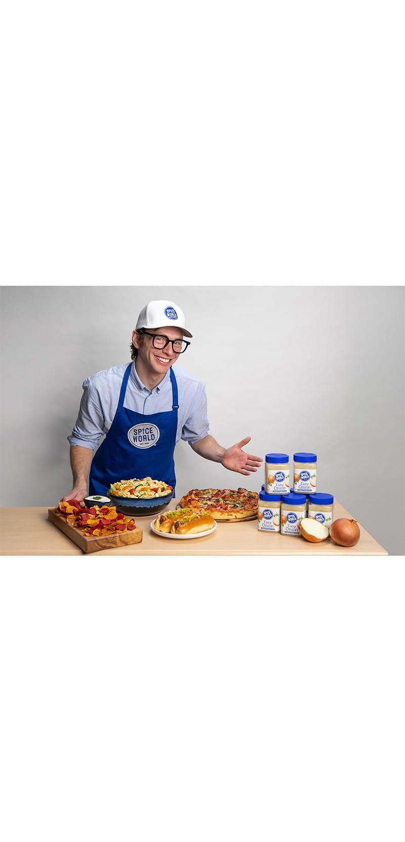 Spice World’s Sample Sam is presenting pasta salad, hotdogs, a dip, and pizza with Easy Onion.