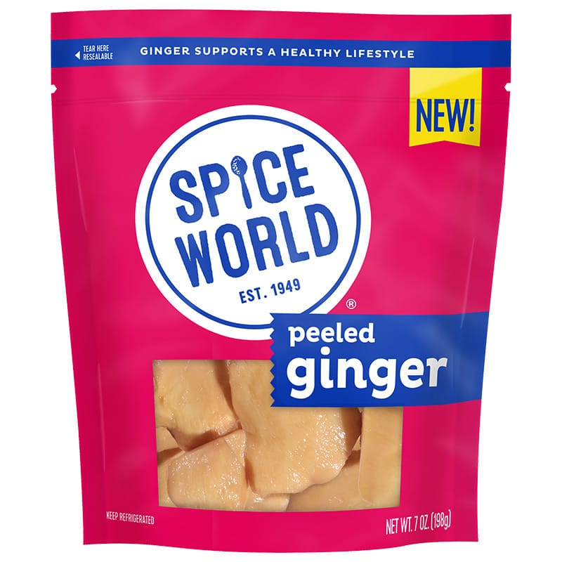 Packaged peeled ginger in a bright pink bag labeled by Spice World, emphasizing health benefits