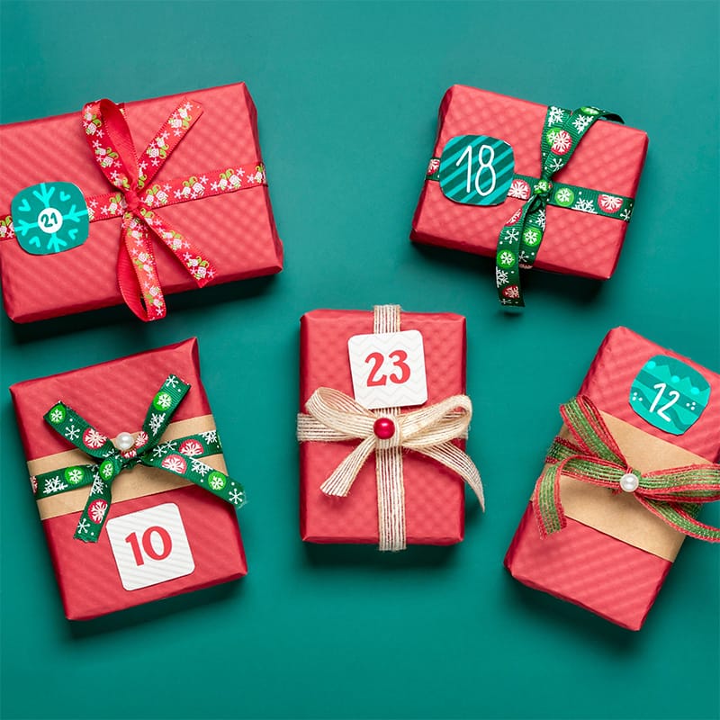 Five festive wrapped gifts ready for a delicious food-themed holiday celebration