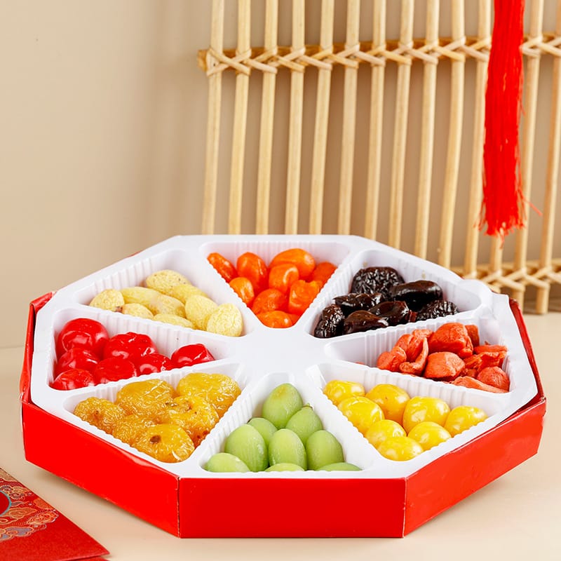 Colorful assortment of sweet snacks in a decorative box, perfect for celebrations and sharing