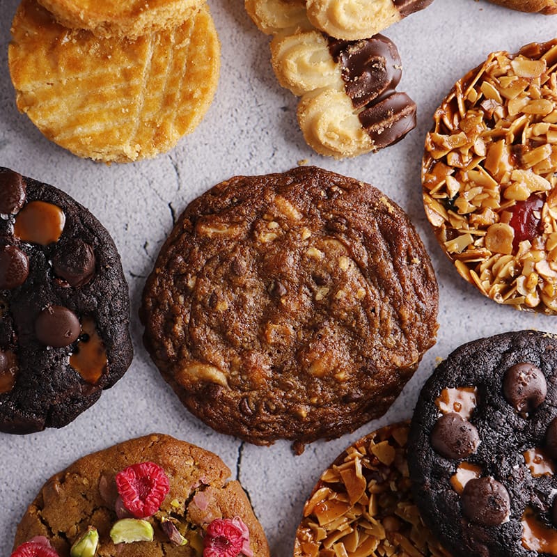 Assorted cookies and treats arranged on a surface, highlighting delicious baked goods for dessert lovers