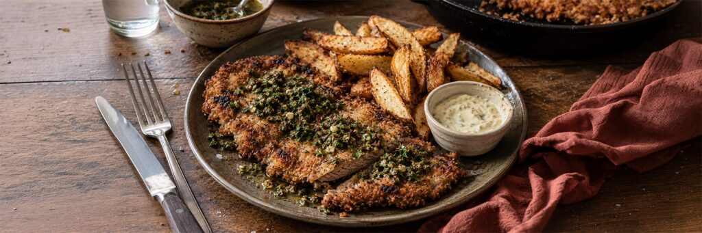Steak Milanesa With Chimichurri Served With Steak Fries and Garlic Aioli
